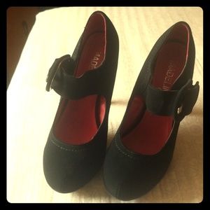Black high heels with buckle